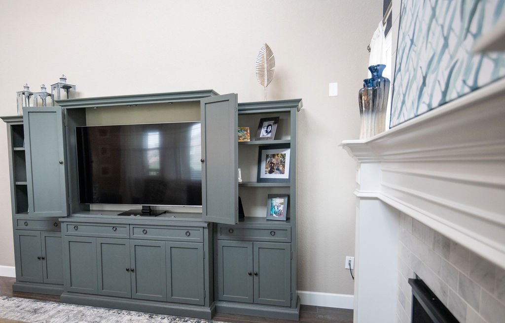 Full-height shiplap fireplace drawing the eye upward, Blackstone family room renovation in Aurora, Colorado