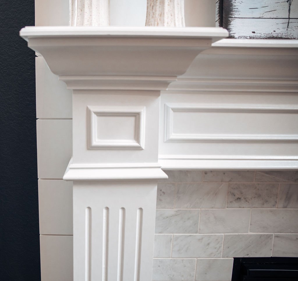 Fireplace and sectional from the kitchen sightline, Blackstone family room renovation in Aurora, Colorado