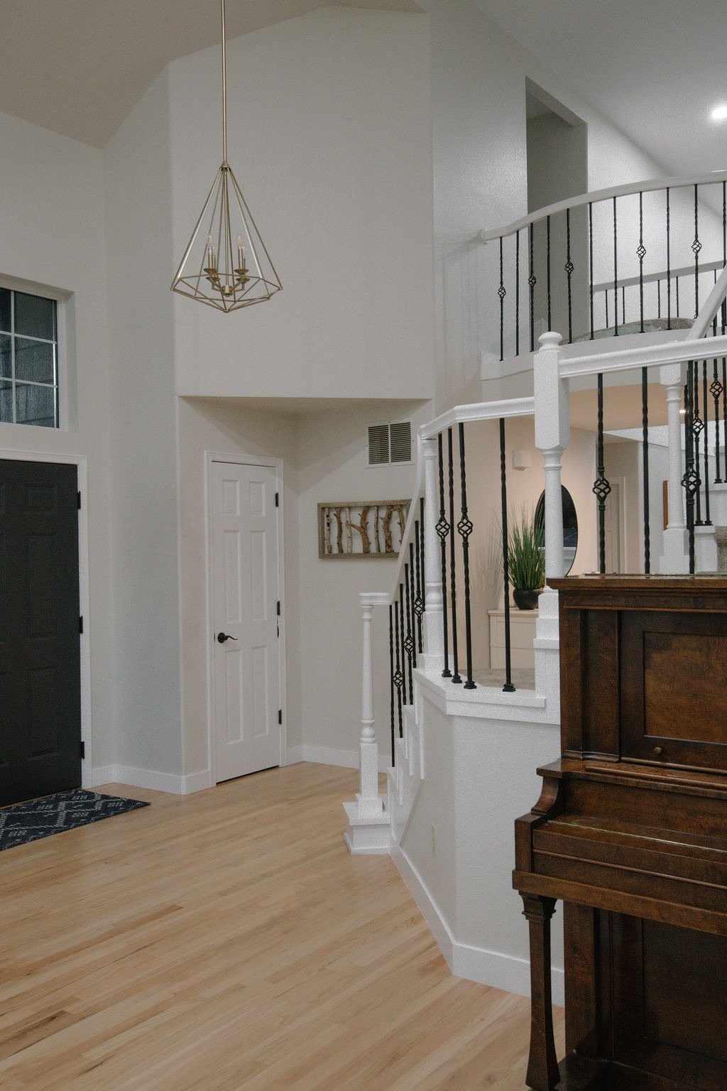 Living room with view to the home office through French doors, Stonegate main floor renovation in Parker, Colorado