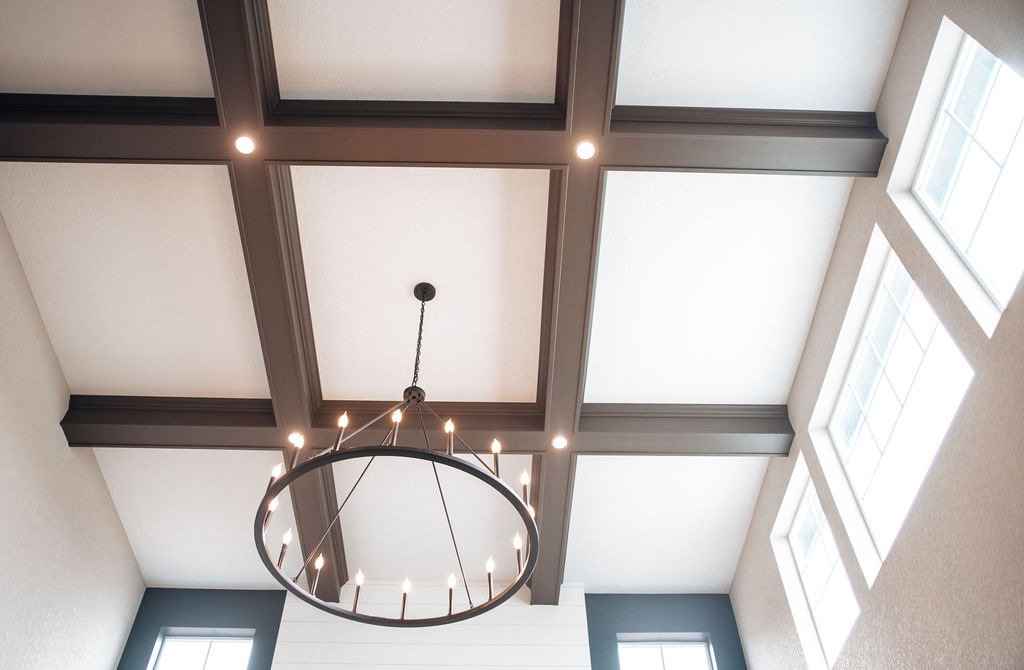 Mantle corner detail with marble surround, Blackstone family room renovation in Aurora, Colorado